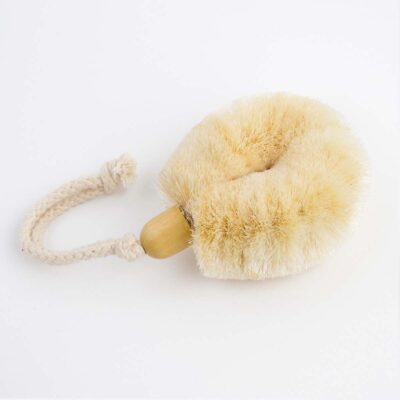 Body Brush excellent for fitting into the palm of your hand for easy use, has with a Cotton Rope handle placed on a white background