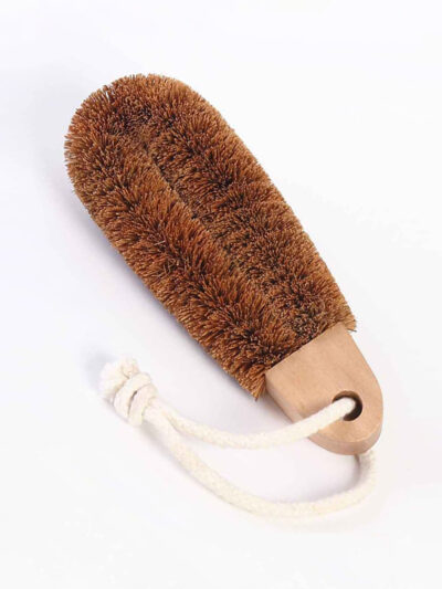 Foot brush made of Coconut Fibre, which is naturally antibacterial, and has a wooden handle with a loop of rope that you can easily slip your hand into for easily removing dead skin and calloused heels.